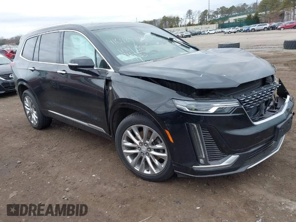 2021 Cadillac XT6 Premium Luxury with VIN 1GYKPCRSXMZ222454, listed as a IAAI auction lot 41648439 with 113,547 mi miles and . Bid and sale history available at carsss.com. Image 1.