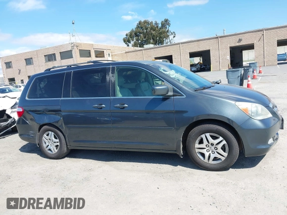 2005 Honda Odyssey TOURING with VIN 5FNRL38885B082482, listed as a IAAI auction lot 41879897 with 159,667 mi miles. Bid and sale history available at carsss.com. Image 13.