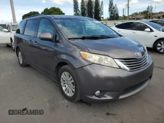 2013 Toyota Sienna XLE AAS with VIN 5TDYK3DC7DS389872, listed as a Copart auction lot 66072995 with 95,797 mi miles and Clean title. Bid and sale history available at DreamBid. Image 4.