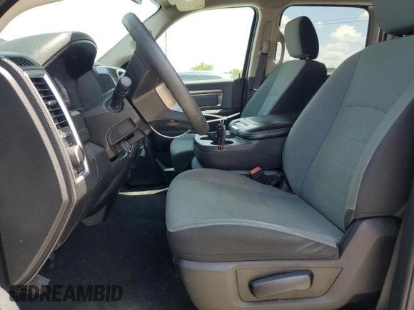 2021 Ram 1500 SLT with VIN 1C6RR7LG1MS549786, listed as a Copart auction lot 54871635 with 77,801 mi miles and Salvage title. Bid and sale history available at DreamBid. Image 7.