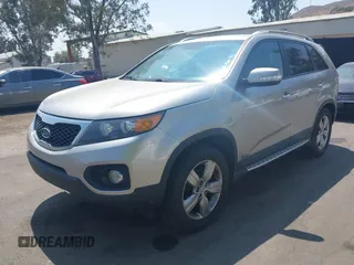 2013 Kia Sorento EX with VIN 5XYKUDA65DG352577, listed as a IAAI auction lot 42174829 with 175,500 mi miles and . Bid and sale history available at DreamBid. Image 2.
