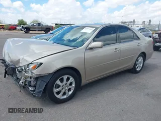 2006 Toyota Camry STD z VIN 4T1BE30KX6U658158, wystawiony jako IAAI lot #42394262 z przebiegiem 102 830 mil mil oraz . Historia ofert i sprzedaży dostępna na DreamBid. Obrazek 19.