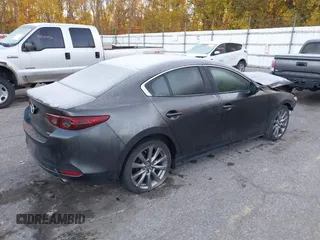 2021 Mazda 3 Preferred with VIN 3MZBPBCL7MM200461, listed as a IAAI auction lot 40614402 with 67,261 mi miles and . Bid and sale history available at DreamBid. Image 4.