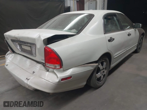 2003 Mitsubishi Diamante LS z VIN 6MMAP67P13T012396, wystawiony jako IAAI lot #40668729 z przebiegiem 157 250 mil mil oraz . Historia ofert i sprzedaży dostępna na DreamBid. Obrazek 4.