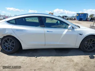 2020 Tesla Model 3 Standard Range Plus with VIN 5YJ3E1EA4LF644967, listed as a IAAI auction lot 41745984 with 23,479 mi miles. Bid and sale history available at carsss.com. Image 14.