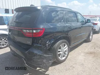2024 Dodge Durango GT Plus with VIN 1C4RDHDG2RC118080, listed as a IAAI auction lot 41870502 with 30,798 mi miles and . Bid and sale history available at DreamBid. Image 4.