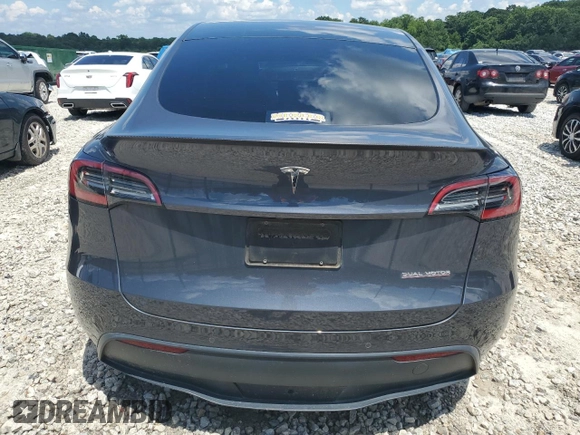 2022 Tesla Model Y Performance with VIN 7SAYGDEF3NF532311, listed as a Copart auction lot 62997535 with 60,530 mi miles and Salvage title. Bid and sale history available at DreamBid. Image 6.