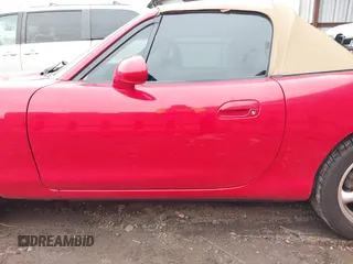 1999 Mazda MX-5 Miata with VIN JM1NB3531X0120856, listed as a IAAI auction lot 41531407 with 92,512 mi miles and . Bid and sale history available at DreamBid. Image 14.