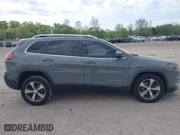 2020 Jeep Cherokee Limited z VIN 1C4PJMDX7LD574229, wystawiony jako IAAI lot #42166058 z przebiegiem 84 935 mil mil oraz . Historia ofert i sprzedaży dostępna na DreamBid. Obrazek 14.