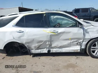2018 Chevrolet Equinox Premier with VIN 2GNAXWEX3J6141427, listed as a IAAI auction lot 41830179 with 76,707 mi miles and . Bid and sale history available at carsss.com. Image 12.