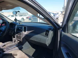 2010 Jeep Grand Cherokee Laredo with VIN 1J4PS4GKXAC103153, listed as a IAAI auction lot 41760743 with 185,138 mi miles. Bid and sale history available at carsss.com. Image 5.