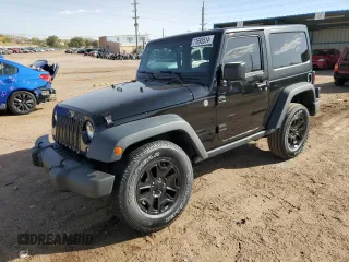 2015 Jeep Wrangler Willys Wheeler with VIN 1C4AJWAG1FL768173, listed as a Copart auction lot 77693514 with 87,950 mi miles and Salvage title. Bid and sale history available at DreamBid. Image 1.