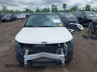 2021 Jeep Compass Altitude with VIN 3C4NJDBBXMT586529, listed as a IAAI auction lot 42296016 with 71,789 mi miles and . Bid and sale history available at DreamBid. Image 13.