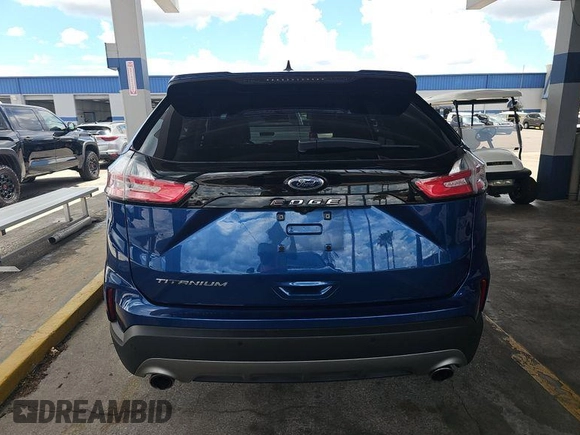 2021 Ford Edge Titanium with VIN 2FMPK3K98MBA53776, listed as a IAAI auction lot 42785493 with 114,856 mi miles and . Bid and sale history available at DreamBid. Image 7.