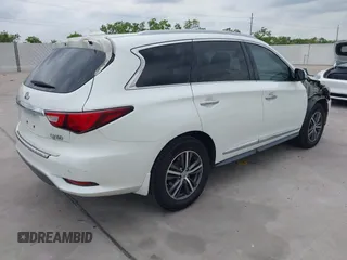 2016 Infiniti QX60 with VIN 5N1AL0MNXGC532149, listed as a IAAI auction lot 42034650 with 124,126 mi miles and . Bid and sale history available at DreamBid. Image 4.