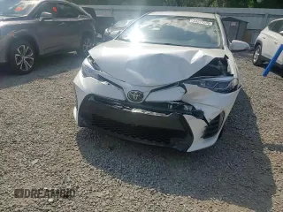 2019 Toyota Corolla L with VIN 5YFBURHE5KP921284, listed as a Copart auction lot 54277235 with 100,935 mi miles and Salvage Title. Bid and sale history available at DreamBid. Image 13.
