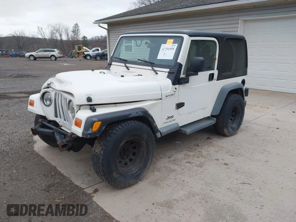 2005 Jeep Wrangler Sport with VIN 1J4FA49S25P352170, listed as a IAAI auction lot 41794958 with 154,304 mi miles. Bid and sale history available at carsss.com. Image 2.