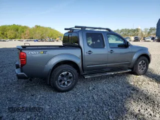 2016 Nissan Frontier Pro-4X with VIN 1N6AD0EVXGN702673, listed as a Copart auction lot 54716865 with 81,258 mi miles and Salvage title. Bid and sale history available at DreamBid. Image 3.