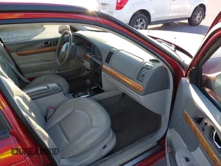 1999 Lincoln Continental with VIN 1LNHM97V8XY633821, listed as a IAAI auction lot 41769620 with 268,617 mi miles and . Bid and sale history available at DreamBid. Image 5.