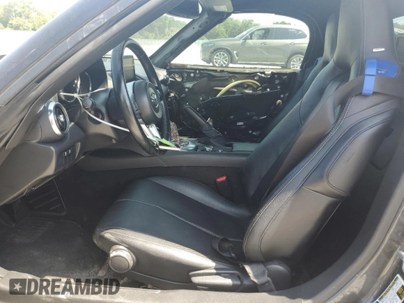 2020 Mazda MX-5 Miata Grand Touring z VIN JM1NDAD77L0414873, wystawiony jako Copart lot #54767785 z przebiegiem 47 579 mil mil oraz Szkoda całkowita • Salvage title. Historia ofert i sprzedaży dostępna na DreamBid. Obrazek 7.