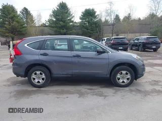 2015 Honda CR-V LX with VIN 5J6RM4H34FL031089, listed as a IAAI auction lot 42123159 with 74,566 mi miles and . Bid and sale history available at DreamBid. Image 13.