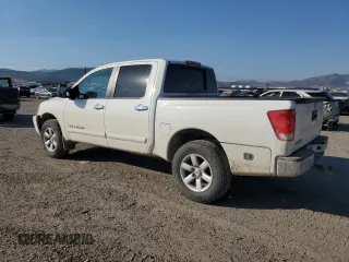 2015 Nissan Titan SV with VIN 1N6AA0EC1FN507132, listed as a Copart auction lot 74401954 with 169,236 mi miles and Salvage title. Bid and sale history available at DreamBid. Image 2.