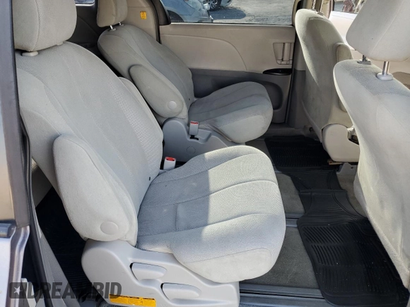 2012 Toyota Sienna with VIN 5TDKA3DC6CS010187, listed as a Copart auction lot 86885234 with 145,745 mi miles and Salvage Title. Bid and sale history available at DreamBid. Image 11.