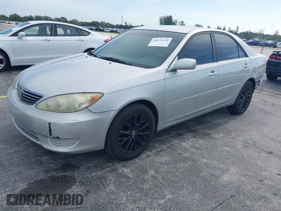 2005 Toyota Camry LE with VIN 4T1BE30K35U572110, listed as a IAAI auction lot 42674324 with 147,480 mi miles and . Bid and sale history available at DreamBid. Image 2.