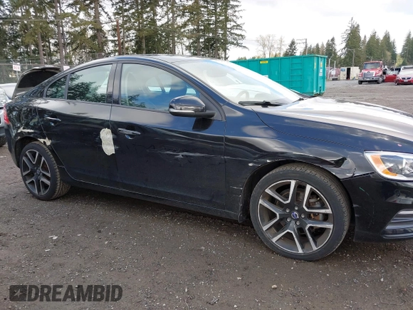 2017 Volvo S60 Dynamic with VIN YV126MFL6H2434644, listed as a IAAI auction lot 41905079 with 51,129 mi miles. Bid and sale history available at carsss.com. Image 6.