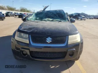 2007 Suzuki Grand Vitara z VIN JS3TE941X74202046, wystawiony jako Copart lot #80221394 z przebiegiem 153 791 mil mil oraz Szkoda całkowita • Salvage title. Historia ofert i sprzedaży dostępna na DreamBid. Obrazek 5.