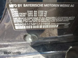 2015 BMW 5 Series 535i with VIN WBA5B1C58FG127959, listed as a IAAI auction lot 41571017 with 122,274 mi miles and . Bid and sale history available at carsss.com. Image 9.