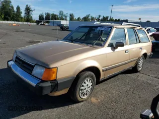 1986 Ford Escort z VIN 1FABP3495GW365298, wystawiony jako Copart lot #72817134 z przebiegiem 65 177 mil mil oraz Tytuł czysty. Historia ofert i sprzedaży dostępna na DreamBid. Obrazek 1.