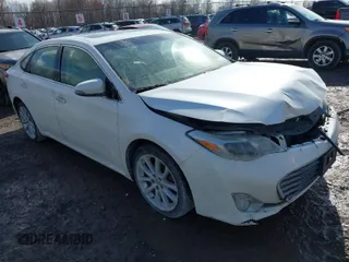 2013 Toyota Avalon XLE with VIN 4T1BK1EB4DU037825, listed as a IAAI auction lot 41963641 with 165,660 mi miles and . Bid and sale history available at carsss.com. Image 1.