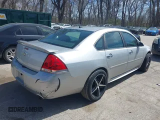 2013 Chevrolet Impala LTZ with VIN 2G1WC5E38D1235332, listed as a IAAI auction lot 41891472 with 137,567 mi miles and . Bid and sale history available at DreamBid. Image 4.
