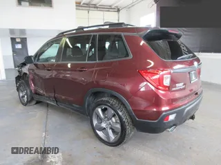 2020 Honda Passport Touring z VIN 5FNYF8H9XLB002041, wystawiony jako Copart lot #78496434 z przebiegiem 39 475 mil mil oraz Szkoda całkowita • Salvage title. Historia ofert i sprzedaży dostępna na DreamBid. Obrazek 4.