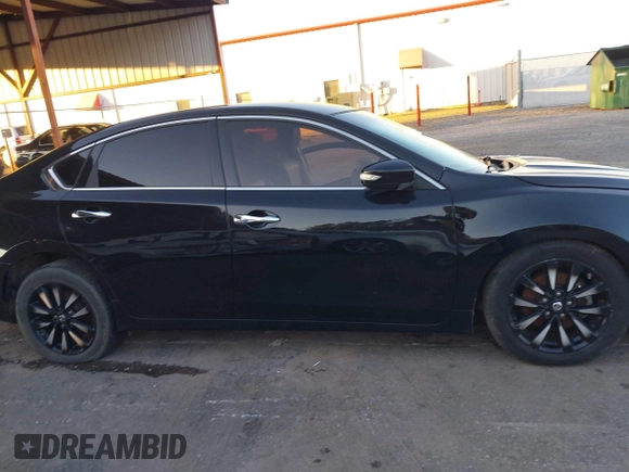 2018 Nissan Altima SR with VIN 1N4AL3AP4JC261940, listed as a IAAI auction lot 41322762 with 143,254 mi miles and . Bid and sale history available at carsss.com. Image 12.