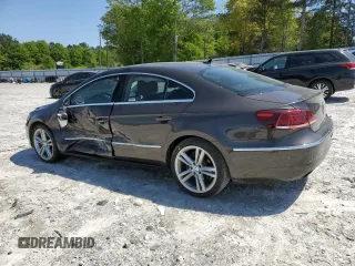 2013 Volkswagen CC Lux with VIN WVWRN7AN4DE546711, listed as a Copart auction lot 52673205 with 106,700 mi miles and Salvage Title. Bid and sale history available at DreamBid. Image 2.