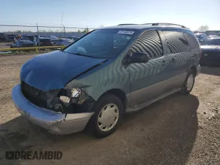 2000 Toyota Sienna CE with VIN 4T3ZF19C1YU285114, listed as a Copart auction lot 87158574 with 267,168 mi miles and Salvage Title. Bid and sale history available at carsss.com. Image 1.