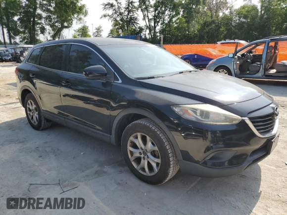 2015 Mazda CX-9 Touring with VIN JM3TB2CA4F0452718, listed as a Copart auction lot 55883255 with 185,733 mi miles and Clean Title. Bid and sale history available at DreamBid. Image 4.