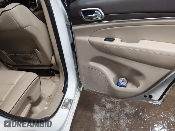2015 Jeep Grand Cherokee Overland with VIN 1C4RJFCG2FC741015, listed as a IAAI auction lot 41607606 with 132,038 mi miles and . Bid and sale history available at DreamBid. Image 8.