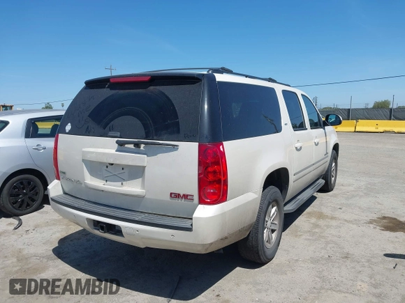 2012 GMC Yukon XL SLT z VIN 1GKS2LE74CR100438, wystawiony jako IAAI lot #42319226 z przebiegiem 172 628 mil mil oraz . Historia ofert i sprzedaży dostępna na DreamBid. Obrazek 4.