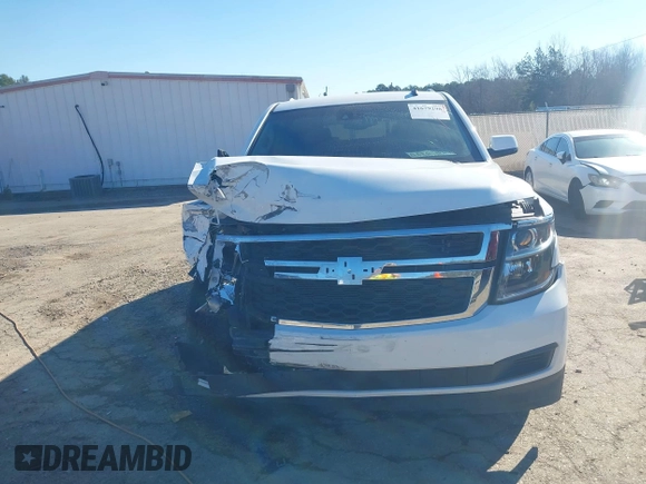 2015 Chevrolet Tahoe LT with VIN 1GNSCBKC0FR104096, listed as a IAAI auction lot 41679298 with 231,005 mi miles and . Bid and sale history available at DreamBid. Image 6.