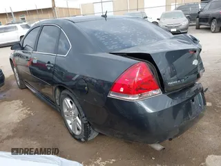 2014 Chevrolet Impala LT with VIN 2G1WB5E35E1123415, listed as a IAAI auction lot 41101111 with 129,870 mi miles and . Bid and sale history available at DreamBid. Image 3.