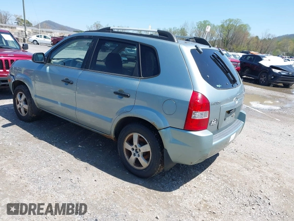 2007 Hyundai Tucson GLS with VIN KM8JM12B27U648659, listed as a IAAI auction lot 41975422 with 248,625 mi miles. Bid and sale history available at carsss.com. Image 3.