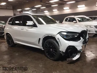 2022 BMW X5 M50i with VIN 5UXJU4C01N9M81857, listed as a IAAI auction lot 41592857 with 15,122 mi miles. Bid and sale history available at carsss.com. Image 1.