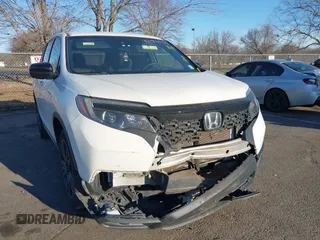 2021 Honda Passport Sport with VIN 5FNYF8H21MB031674, listed as a IAAI auction lot 41739769 with 36,894 mi miles and . Bid and sale history available at DreamBid. Image 6.