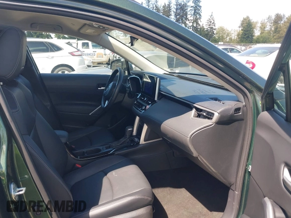 2023 Toyota Corolla Cross XLE with VIN 7MUEAAAG6PV052816, listed as a IAAI auction lot 42386639 with 42,736 mi miles and . Bid and sale history available at DreamBid. Image 5.