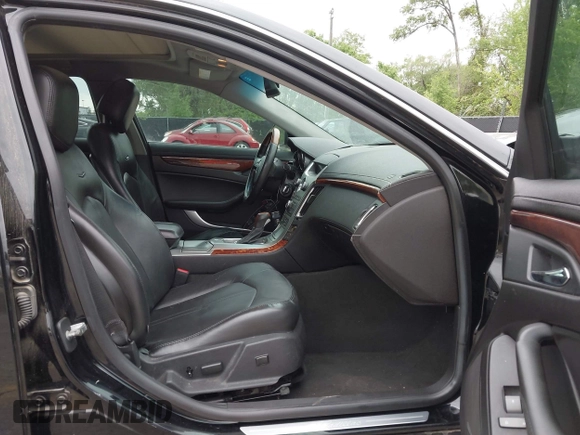 2009 Cadillac CTS AWD w/1SB with VIN 1G6DT57V290165006, listed as a IAAI auction lot 42144947 with 162,969 mi miles. Bid and sale history available at carsss.com. Image 5.