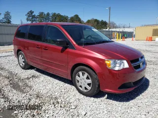 2014 Dodge Grand Caravan American Value with VIN 2C4RDGBG3ER323793, listed as a Copart auction lot 49095945 with 102,129 mi miles and Salvage Title. Bid and sale history available at DreamBid. Image 4.