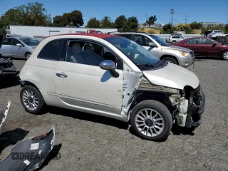 2013 FIAT 500 Lounge with VIN 3C3CFFER9DT744019, listed as a Copart auction lot 63481055 with 49,869 mi miles and Salvage title. Bid and sale history available at DreamBid. Image 4.